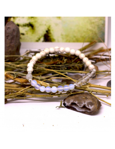 Pulsera elástica minerales 6 mm en tonos dorados y rubi representando al arcangel Uriel . la pulsera contiene la numerologia sa 2