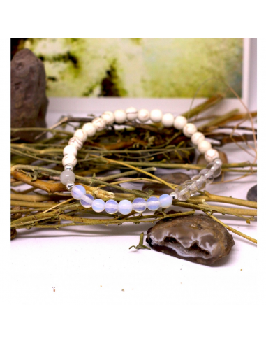 Pulsera elástica minerales de 6 mm en color blanco representando al arcángel Gabriel. La pulsera contiene la numerologia sagrad